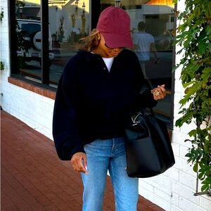 “Airport Sweatshirt” by viral brand Rumored
Black 
Size S/M
Never opened